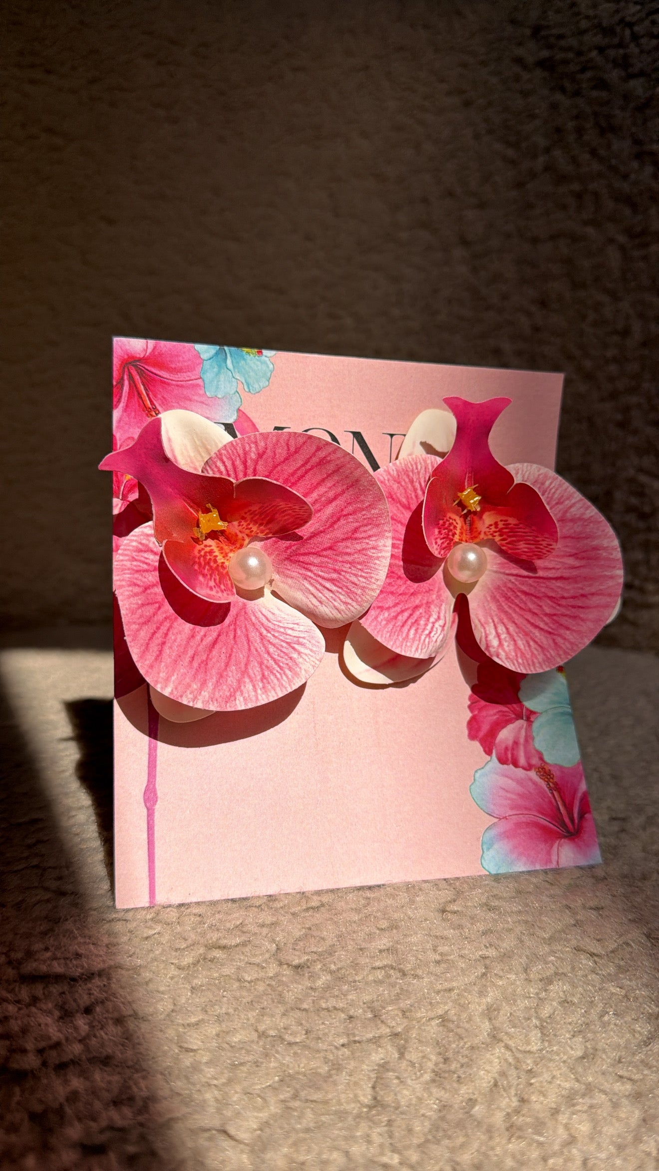 Orchid floral earrings.